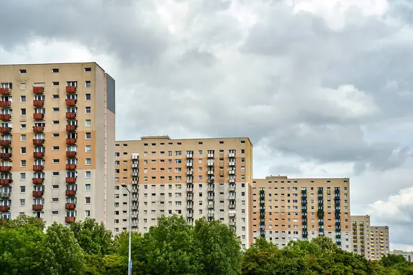 The facade  with balconies of a residential high-rise buildings in Poznan , Poland
