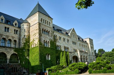 Stone historic Imperial castle with towers in Poznan, Poland