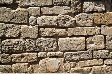 Yunanistan 'ın Girit adasındaki antik Roma kenti Gortyna' nın kalıntılarındaki taş bir duvarın parçası