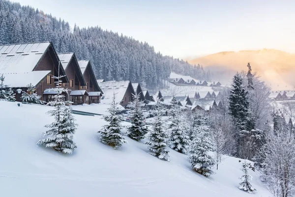 stock image Beautiful winter village in the morning. Winter holiday at ski resort