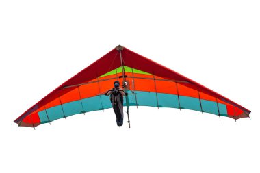 Colorful hang glider wing isolated on white. Girl pilot soar on her wing in the sky clipart