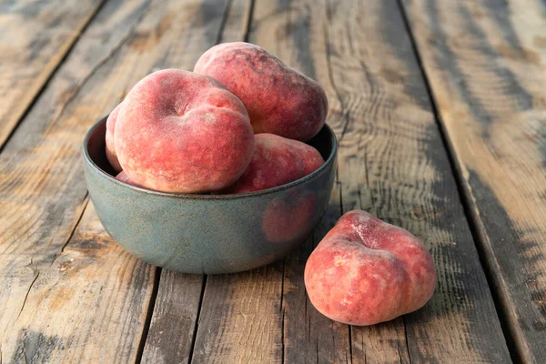 Ceramic Bowl Donut Peaches Wooden Table — Stock Photo, Image