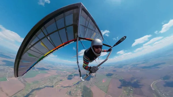 Hang Glider Pilot Rainbow Colored Wing Soars High Sky — Stock Photo, Image