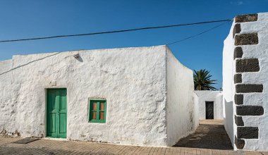 Facade detail, doors and windows on residential houses in Teguise, Lanzarote, Canary Islands, Spain