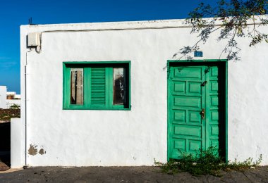 Facade detail, doors and windows on residential houses in Teguise, Lanzarote, Canary Islands, Spain