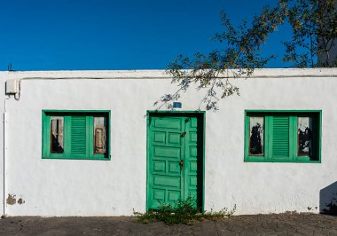 Facade detail, doors and windows on residential houses in Teguise, Lanzarote, Canary Islands, Spain