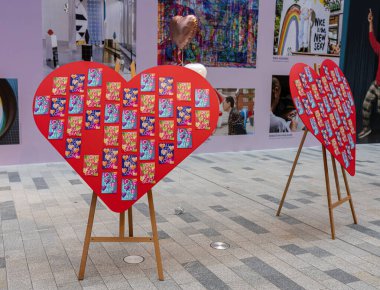 The Playce, decoration of red hearts in the arcades at Potsdamer Platz, Berlin, Germany