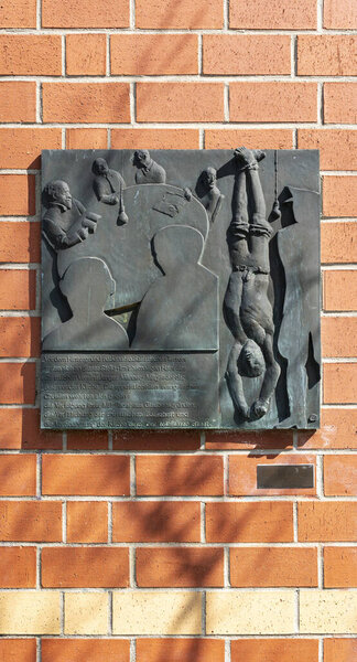 Bronze plaque on the house of the former Association of Christian Young Men, Berlin, Germany