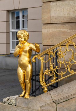 Gilded putti on the flag staircase at the state parliament, Potsdam, Brandenburg, Germany clipart