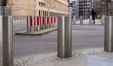 Bollards at the security area, Foreign Office, entrance to the underground car park, Berlin, Germany clipart