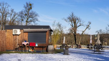 Gastronomy at the Babelsberg Palace Park in winter, Potsdam, Brandenburg, Germany clipart