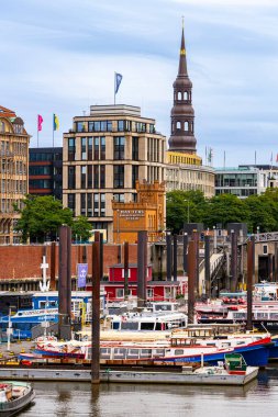 Ships, sailing boats, and barges in the Port of Hamburg at the Speicherstadt, Hamburg, Germany