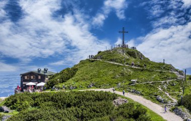 Natural and environmentally friendly landscape and the mountains around the summit of the Untersberg, sunny weather with blue skies attracts mountaineers and tourists to Grdig, Austria