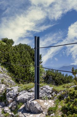 Natural and environmentally friendly landscape and the mountains around the summit of the Untersberg, sunny weather with blue skies attracts mountaineers and tourists to Grdig, Austria