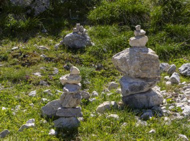 Stacked small boulders, natural decoration of small stones on the mountain slope on the Untersberg, Grdig, Austria