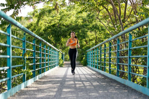 Shot Beautiful Sporty Young Woman Running Bridge — Stock Photo, Image
