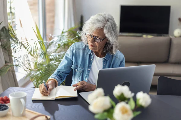 Shot Beautiful Senior Woman Working Laptop While Checking Some Documents — Fotografia de Stock