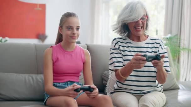Video Cute Granddaughter Teaching Her Grandmother Play Video Games Console — Video Stock