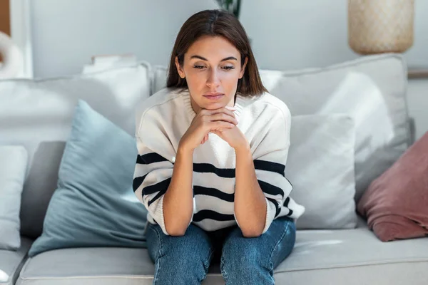 Shot Depressed Young Woman Thinking Her Problems While Sitting Sofa — Stock Photo, Image