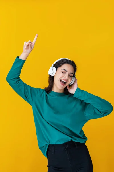 Portrait Smiling Woman Dancing Listening Music Headphones Isolated Yellow — Stock Photo, Image