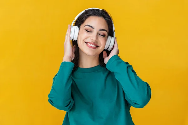 Portrait Smiling Woman Dancing Listening Music Headphones Isolated Yellow — Stock Photo, Image
