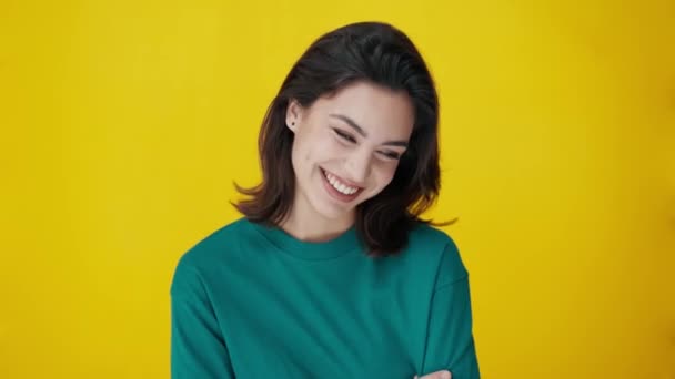Video Beautiful Woman Smiling While Looking Camera Isolated Yellow — Stock Video