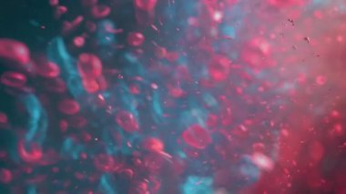 Çarpıcı bir yakın plan arkaplana sıçrayan renkli boyanın canlı dinamiklerini ortaya çıkarır.