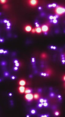 Renkli parçacıkların canlandırması Arka plan dikey videosu