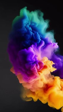 Soyut renkli mürekkep ve duman dalgaları dikey video