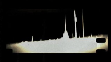 Çizikler ve ışık sızıntıları olan bir film şeridi.