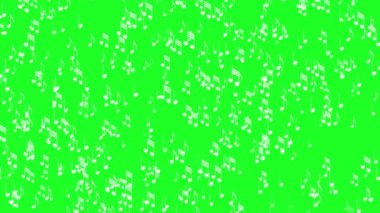 Müzik notaları canlı yeşil bir arkaplana nazikçe çarpar.