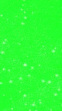 Yeşil, harfi harfine çekilmiş bir videoda kar taneleri