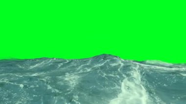 Güzel bir şekilde saydam okyanus tarzı dalgalar yeşil ekrana karşı çarpıcı bir görünüm yaratıyor.