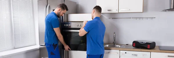 Home Appliance Repair Service. Oven Installation By Repairmen