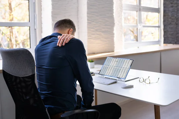 Man With Back Pain. Bad Office Posture