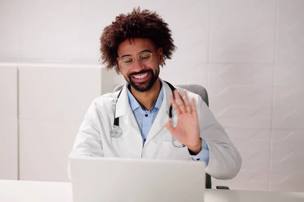 African American Doctor Video Conference Call On Computer