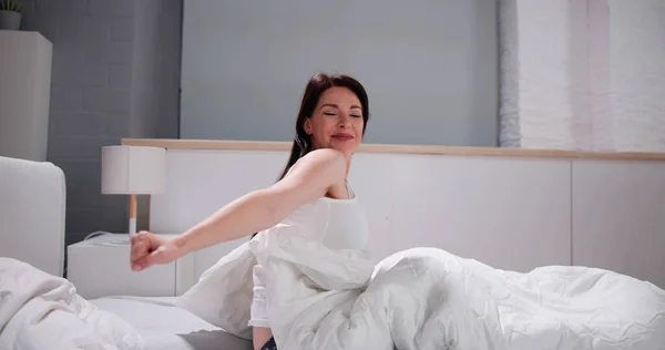 Woman Waking Up. Whole Body Wakeup And Stretching