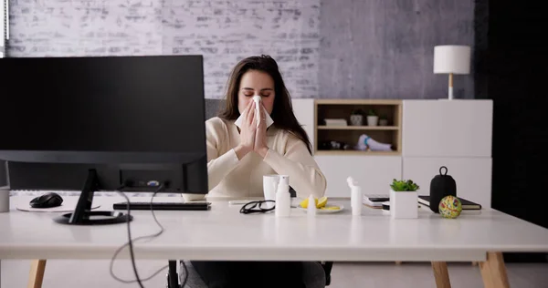 Sick Office Employee Sneezing At Work. Business Executive