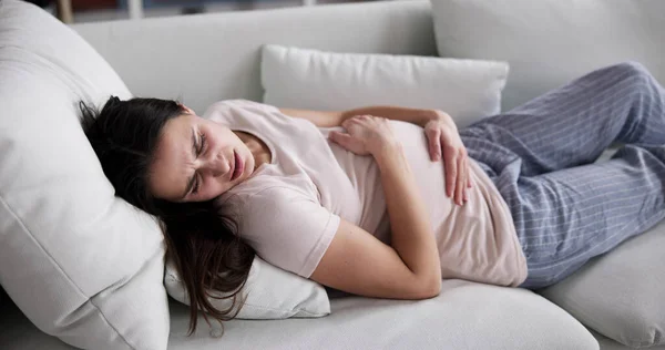 Young Pregnant Woman Suffering Stomach Ache Home — Stok fotoğraf
