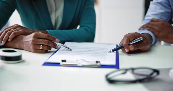 Lawyer Contract Mediation And Review. Two Reading Corporate Document