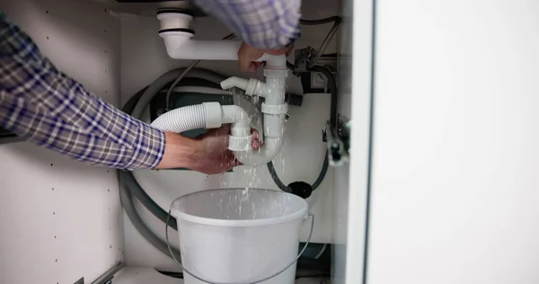 Plumber Fixing Pipe Leak Broken Kitchen Sink — Photo