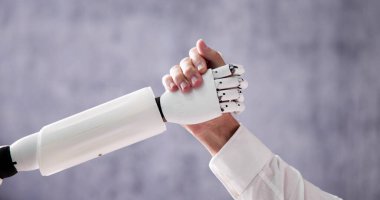 AI Robot And Human Man Hand Handshake