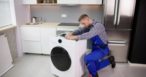 Washing Machine Repair Problem Man Fixing Appliance — Stok fotoğraf