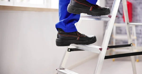 Man Climbing Step Ladder Safety Shoes — Stock Photo, Image
