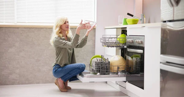 Young Woman Taking Drinking Glass Dishwasher Kitchen — Stock Photo, Image