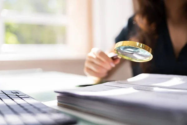 Auditor Investigating Corporate Fraud Using Magnifying Glass — Stock Photo, Image