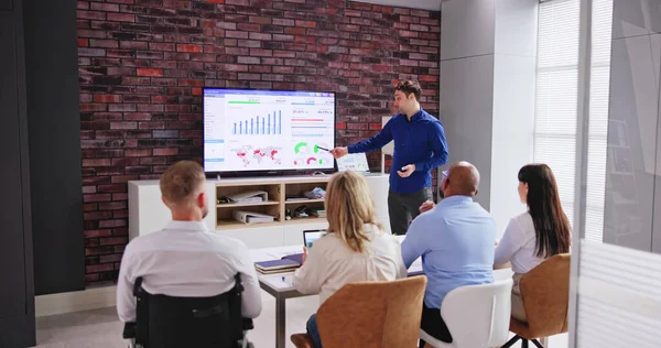 Businesspeople Looking Businessman Giving Presentation Meeting — Stockfoto