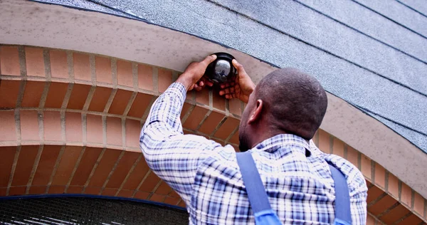 African American Handyman Cctv Camera Installer Ladder — Stock Photo, Image