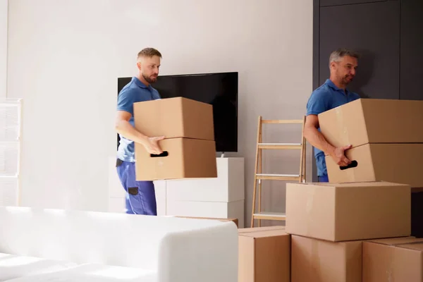Movers Delivering Packaging Boxes Moving Relocation — Stock Photo, Image