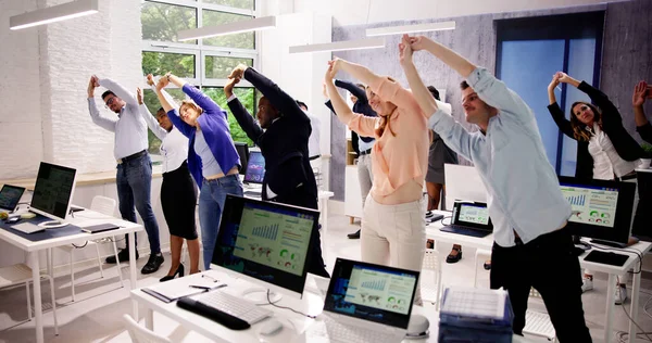 Stretch Exercise In Office For Business Worker Team
